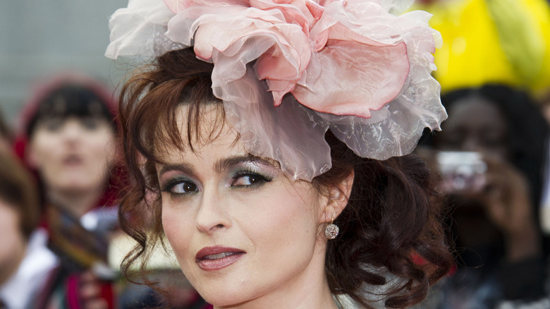 Helena Bonham Carter wearing pink flower headpiece