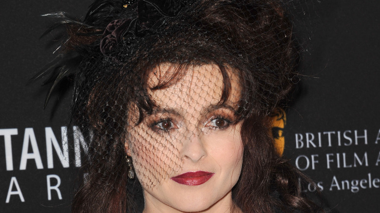 Helena Bonham Carter wearing a black netted veil 