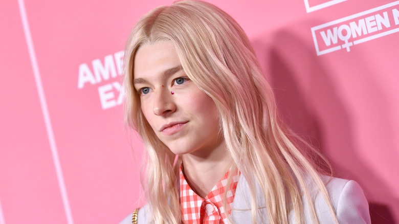 Hunter Schafer wearing a checkered shirt