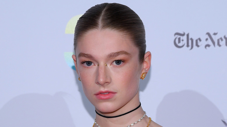 Hunter Schafer gives a serious look