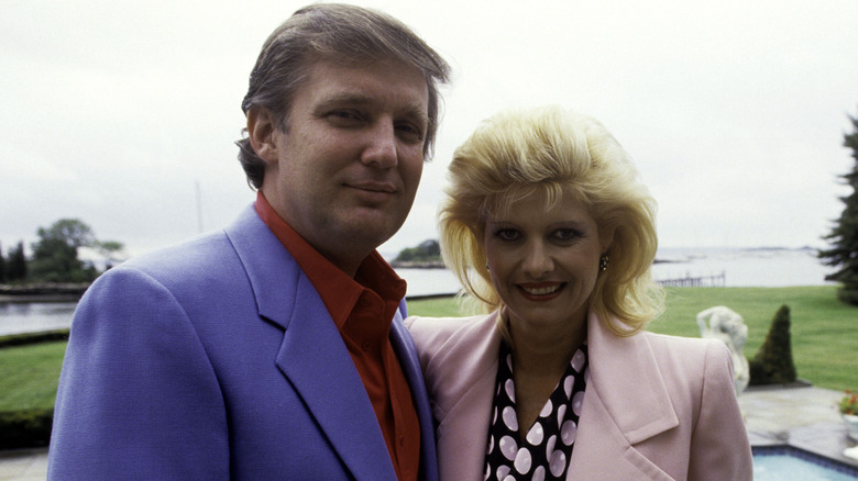 Ivana Trump posing with Donald Trump at a poolside