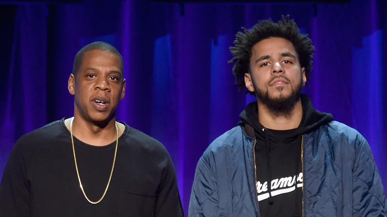 Jay-z and J. Cole posing