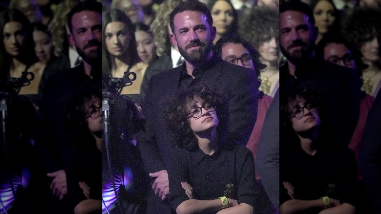 Ben Affleck and Emme stand together