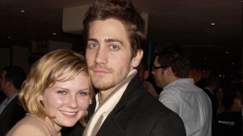 Kirsten Dunst and Jake Gyllenhaal posing