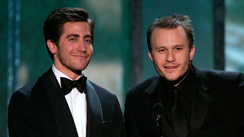 Jake Gyllenhaal and Heath Ledger on a stage