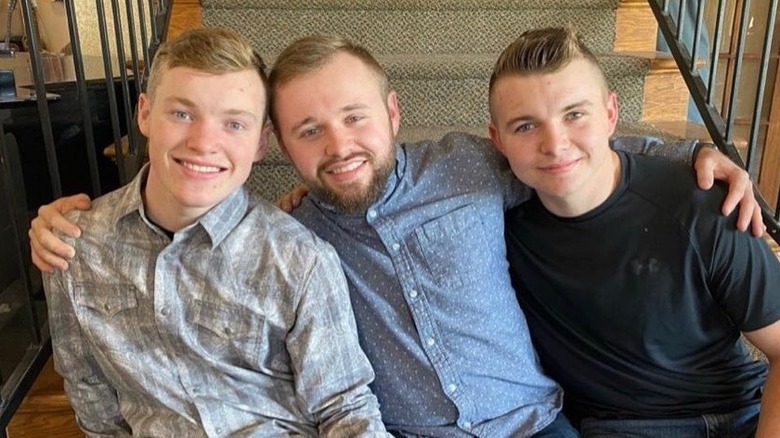 Justin, Jason, and James Duggar smiling