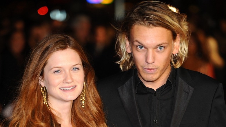 Bonnie Wright and Jamie Campbell Bower, smiling