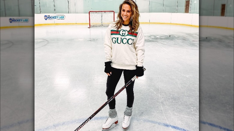 Jana Kramer posing ice rink