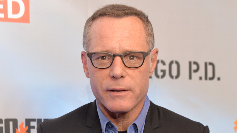 Jason Beghe wearing glasses