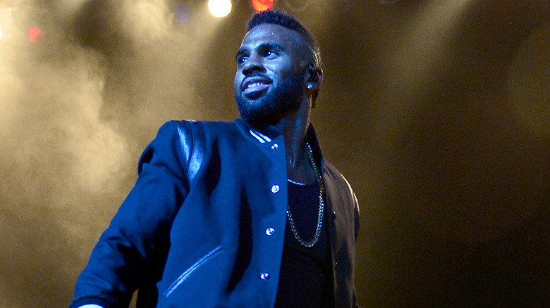 Jason Derulo smiling on stage