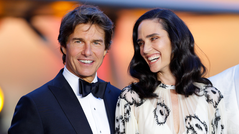 Tom Cruise and Jennifer Connelly laughing