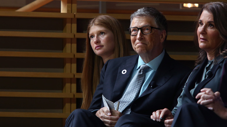 Jennifer Gates and her parents listening to ex-President Barack Obama speak