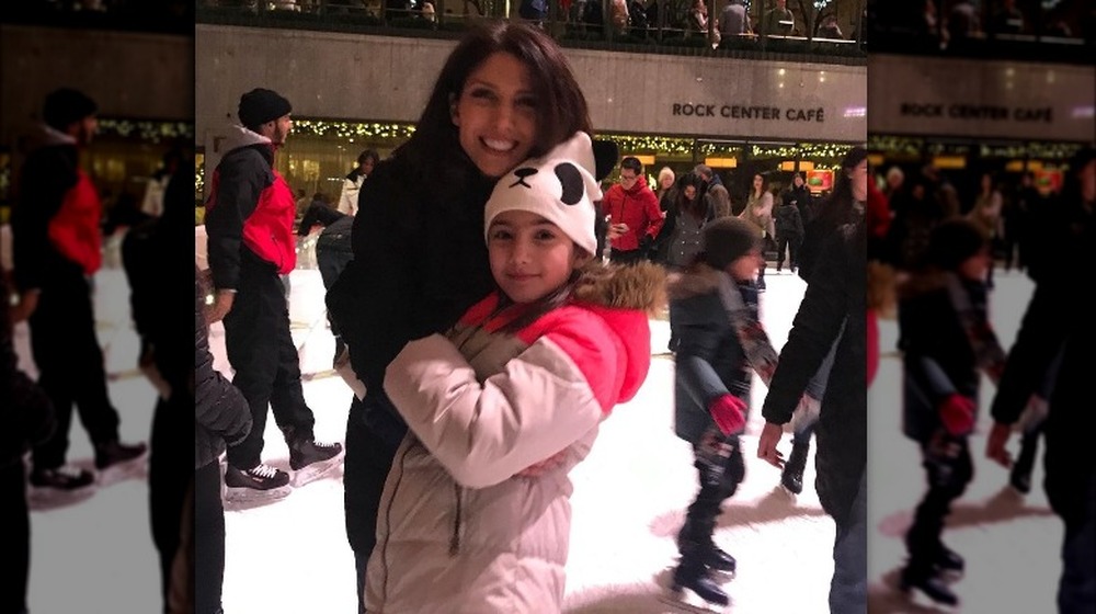 Lynda Lopez and daughter Lucie Wren Lopez-Goldfried ice skating