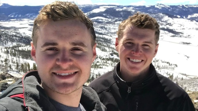 Jedidiah and Jeremiah Duggar on a mountaintop 