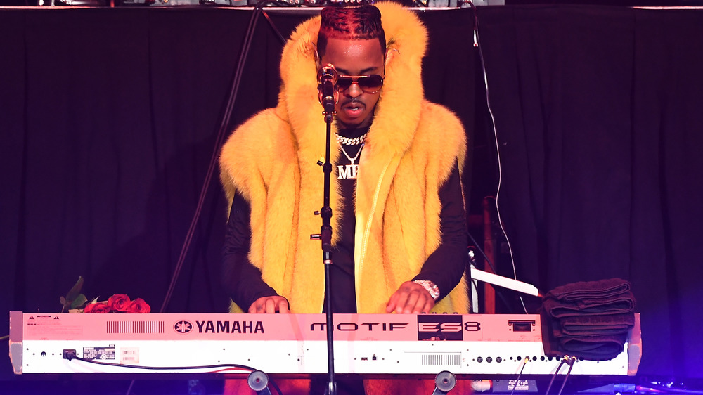 Jeremih playing the keyboard