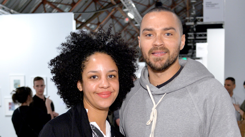 Aryn Drake-Lee and Jesse Williams posing at an event