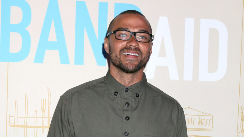 Jesse Williams posing at an event