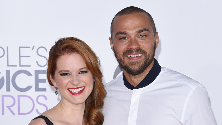 Jesse Williams and Sarah Drew posing at an event