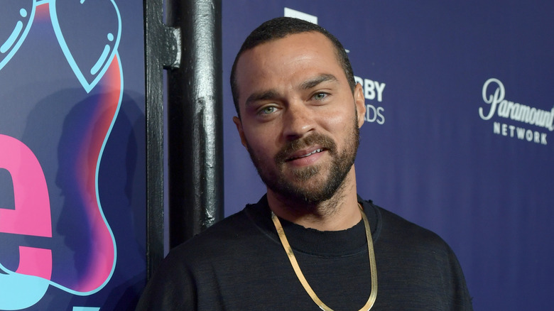 Jesse Williams posing at an event