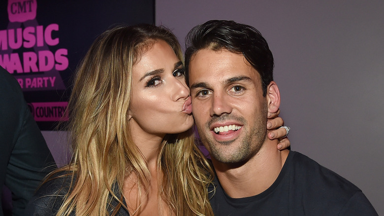 Jessie James Decker kissing Eric Decker on the cheek