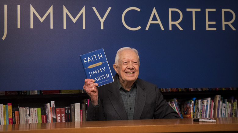 Jimmy Carter with his book