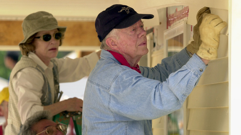 Jimmy Carter building a house