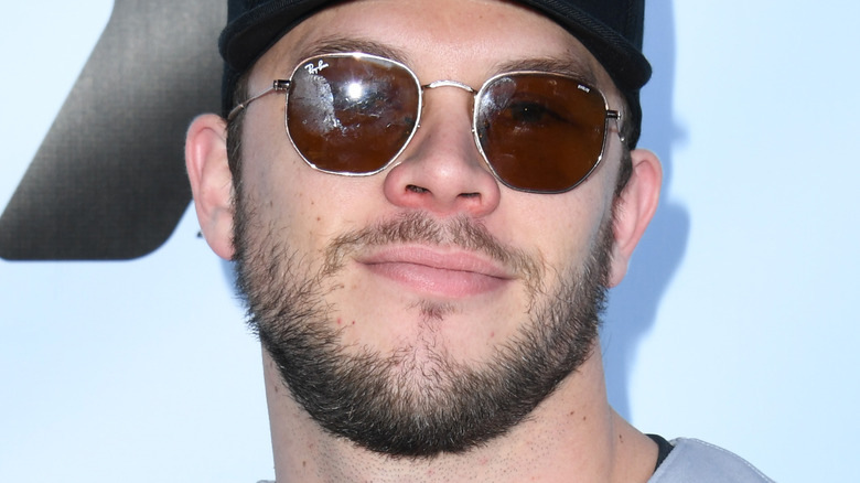 Jimmy Tatro wearing sunglasses