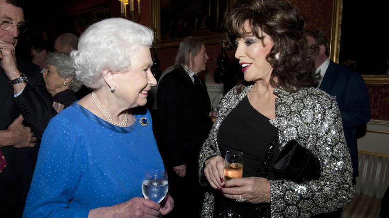 Queen Elizabeth II and Joan Collins, speaking