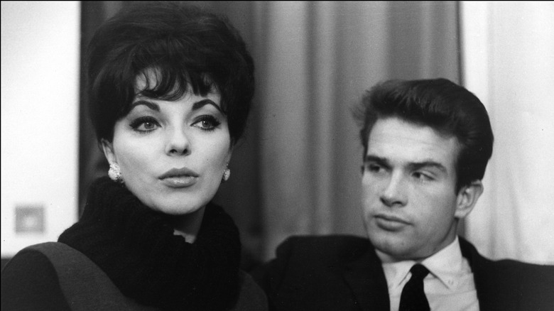 Joan Collins and Warren Beatty both seated