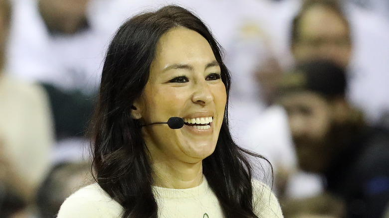 Joanna Gaines with a microphone