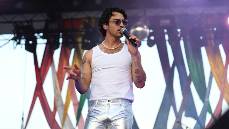 Joe Jonas performing at a pride event