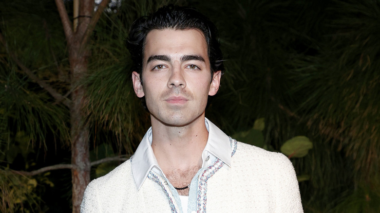 Joe Jonas posing outdoors