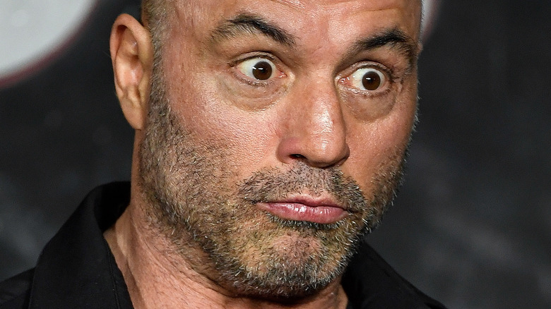 Joe Rogan making a face on stage