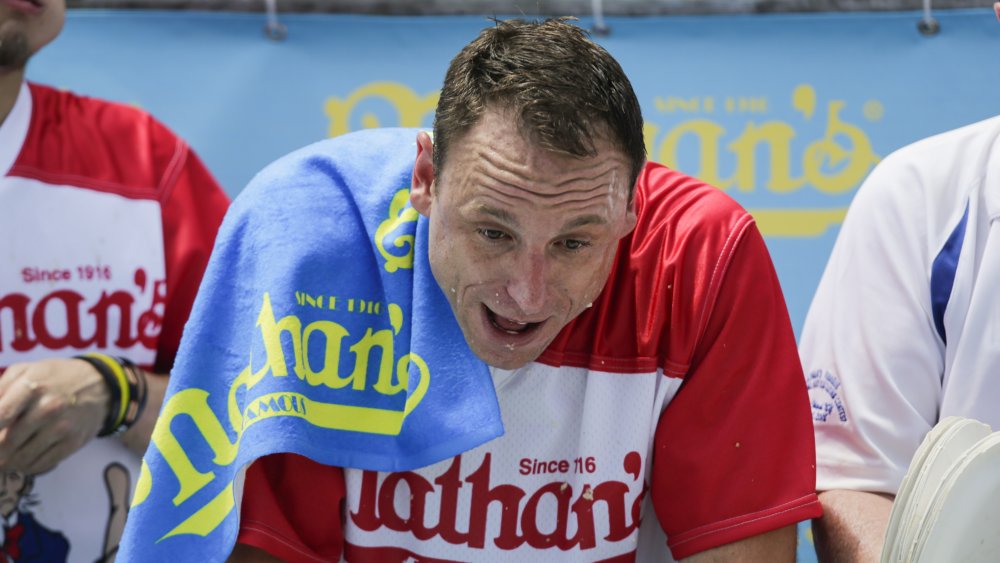 Joey Chestnut taking a breather during a hot dog eating contest