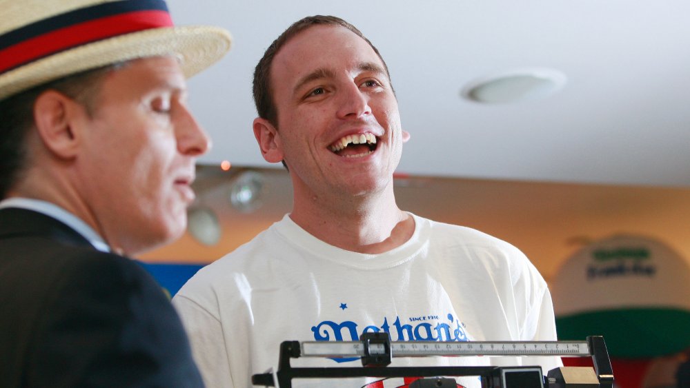 Joey Chestnut getting weighed