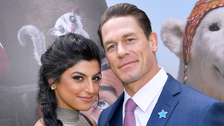 Shay Shariatzadeh and John Cena standing together