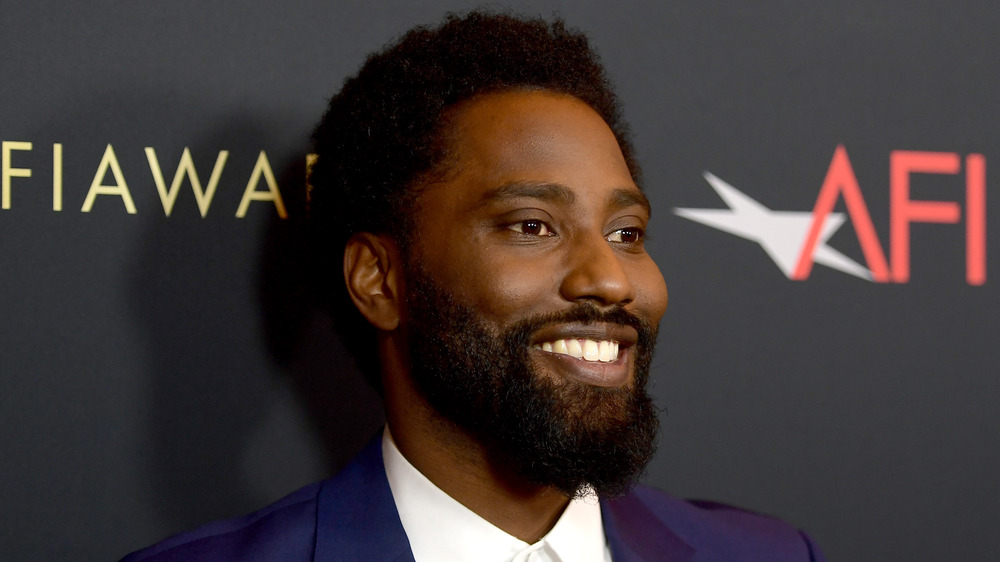 John David Washington with a big smile