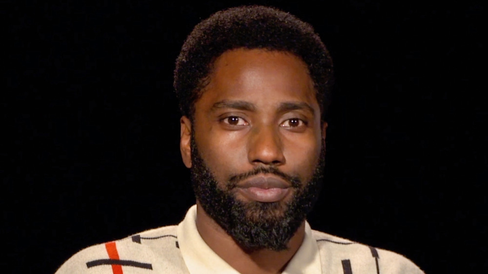 John David Washington looking at camera