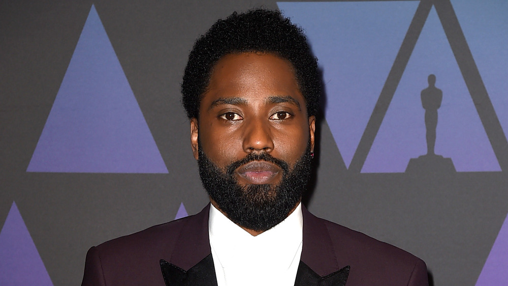 John David Washington in a red tux