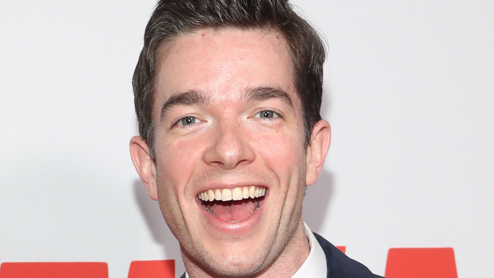 John Mulaney laughing