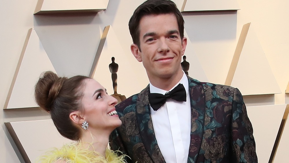 Annamaire Tendler gazing up at John Mulaney