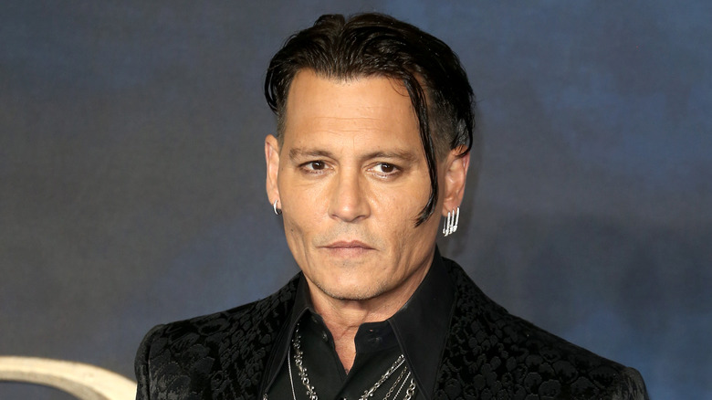 Johnny Depp in black suit 