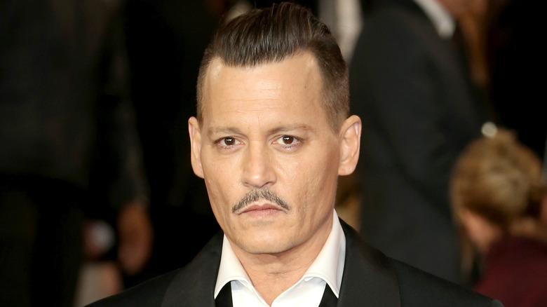 Johnny Depp stares ahead