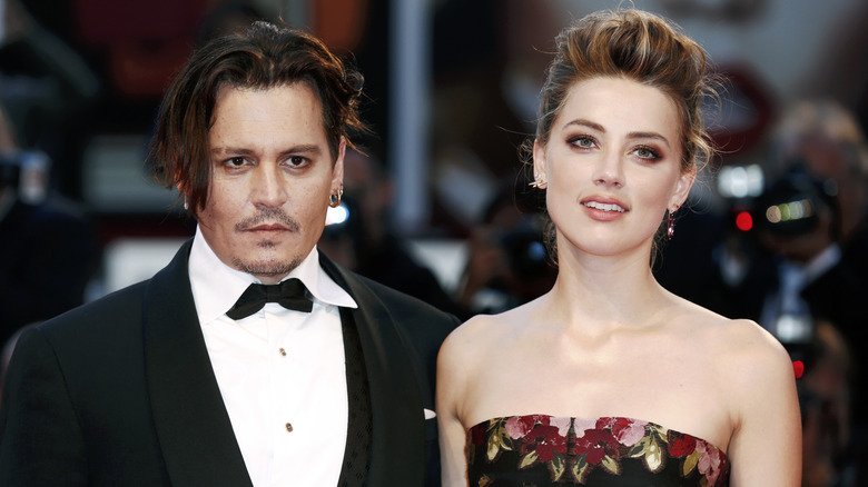 Johnny Depp and Amber Heard pose