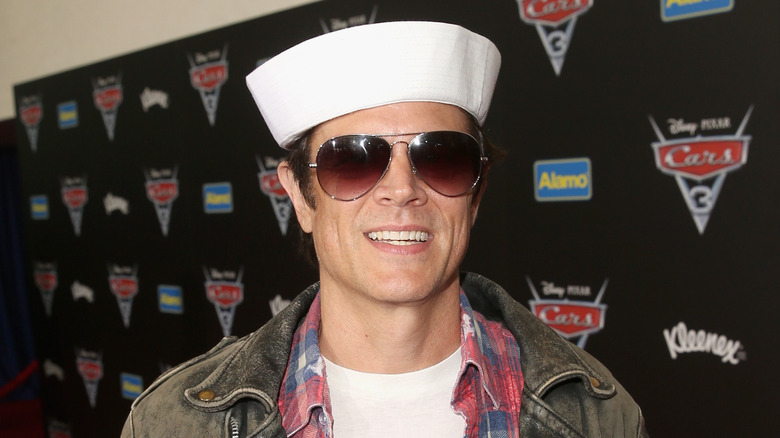 Johnny Knoxville in a sailor hat