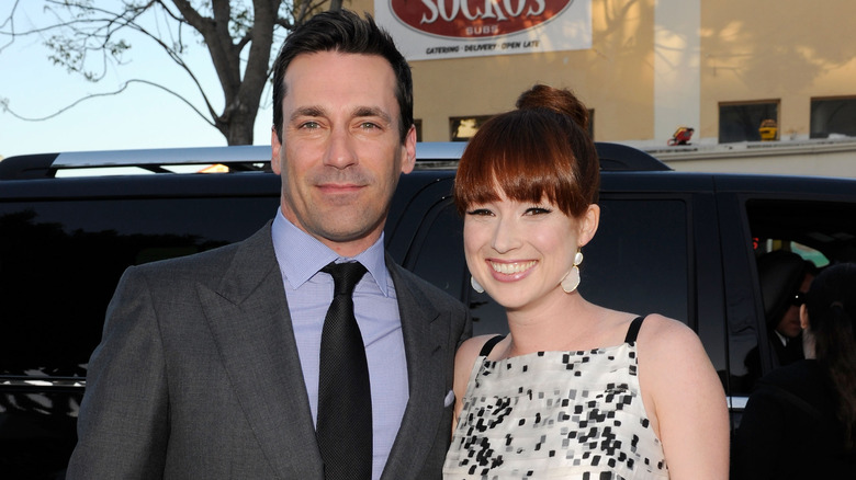 Jon Hamm posing with Ellie Kemper