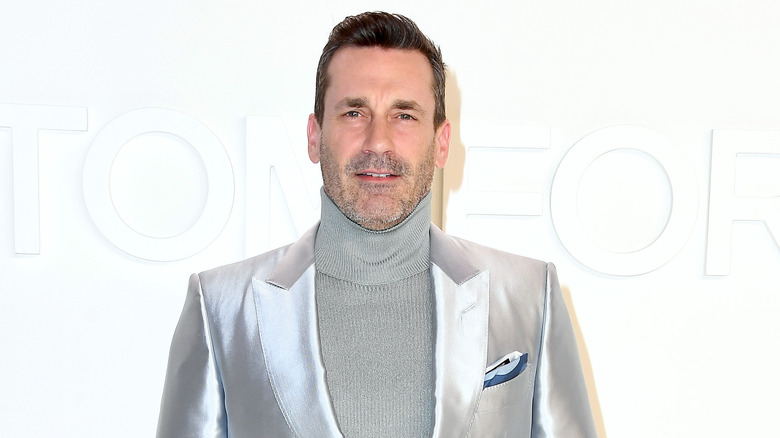 Jon Hamm wearing turtleneck, silver suit