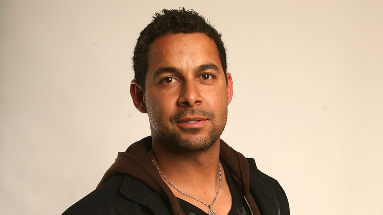 Jon Huertas looking at camera