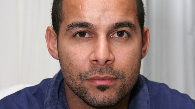 Jon Huertas looking at camera