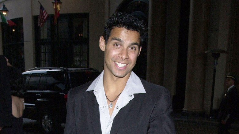 Young Jon Huertas smiling